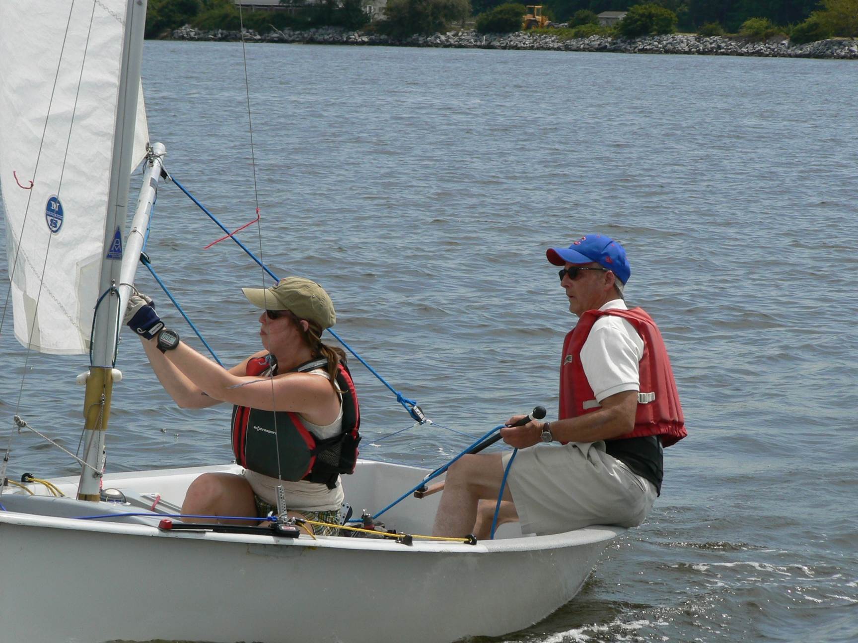 A person and person sailing on a boat
AI-generated content may be incorrect.